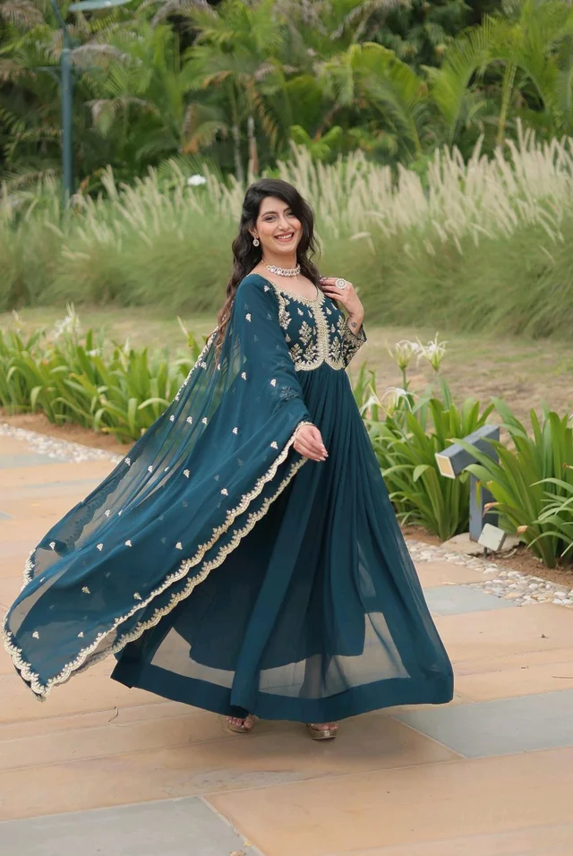 Beautiful Aqua Blue Color Zari Embroidered Work Gown
- Big Stone, XXL