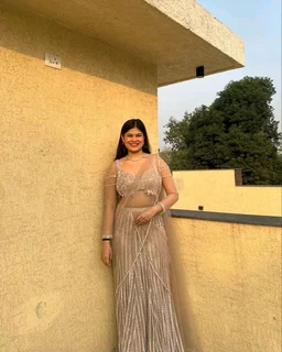 Ethereal Peach Net Saree With Pearl & Katdana Handwork
- Just Right, Free Size