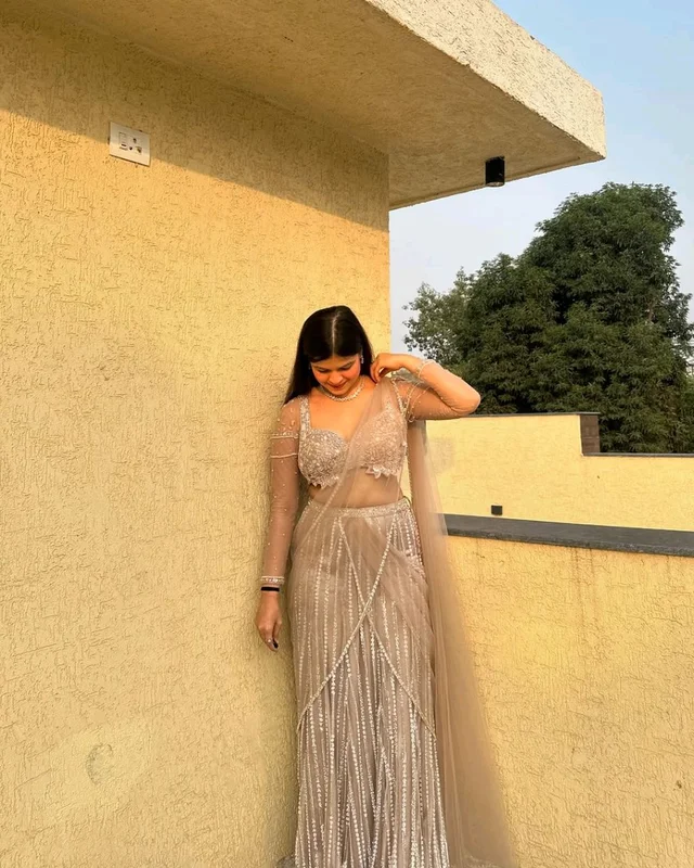 Ethereal Peach Net Saree With Pearl & Katdana Handwork
- Just Right, Free Size