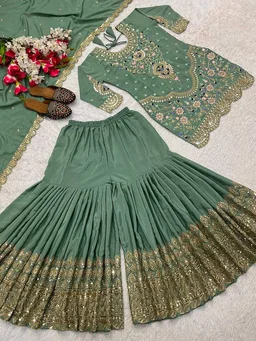 Stylish Heavy Work Teal Green Color Sharara Suit
- Pista, XXL