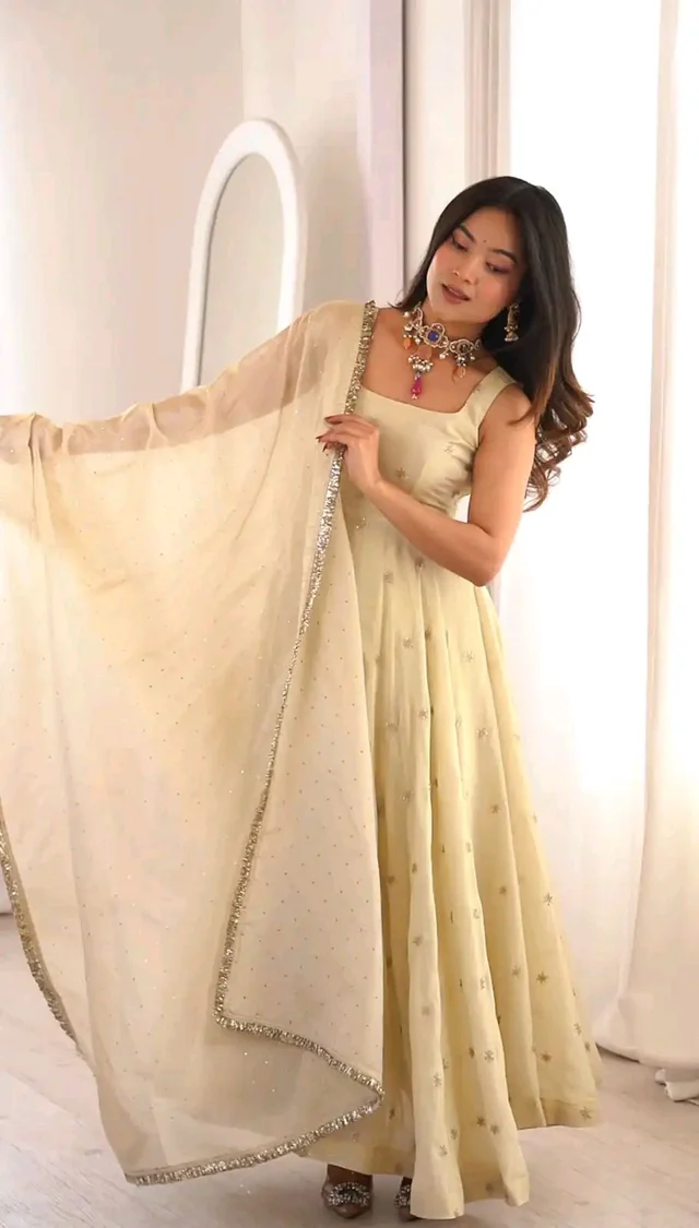 Off White Cosmos Gold Embroider Work Salwar Suit
- L, Chino