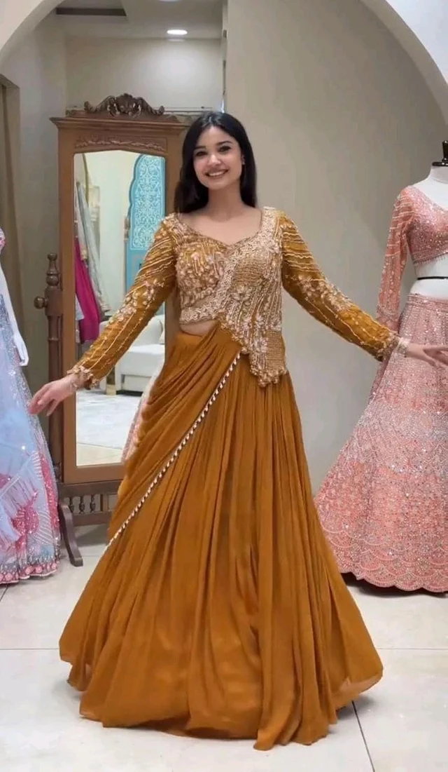 Lehenga Choli Indo-Western Draped Set For Womens And Girls Ready To Wear Hevay Rangoli Silk Fabric With Work Multi Thread Embroidery Sequence Work
- Free Size, Mustard