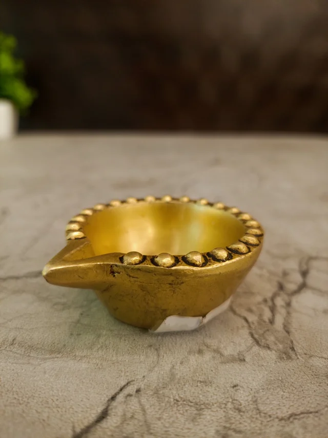 DecorsOne Brass Agal Swasthik Diya 1″