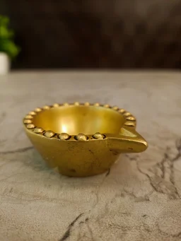 DecorsOne Brass Agal Swasthik Diya 1″