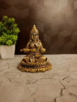 DecorsOne Premium Brass Annapoorani on Lotus Base Idol. Perfect for your pooja room or gifting