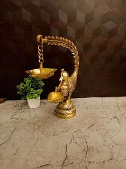 DecorsOne Illuminate your space with the Premium Brass Single Face Peacock Hanging Diya (Mayil Deepam).