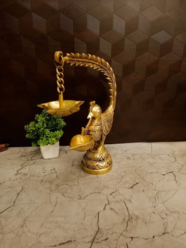 DecorsOne Illuminate your space with the Premium Brass Single Face Peacock Hanging Diya (Mayil Deepam).