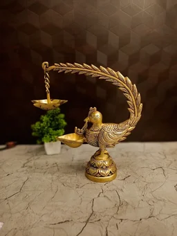 DecorsOne Illuminate your space with the Premium Brass Single Face Peacock Hanging Diya (Mayil Deepam).