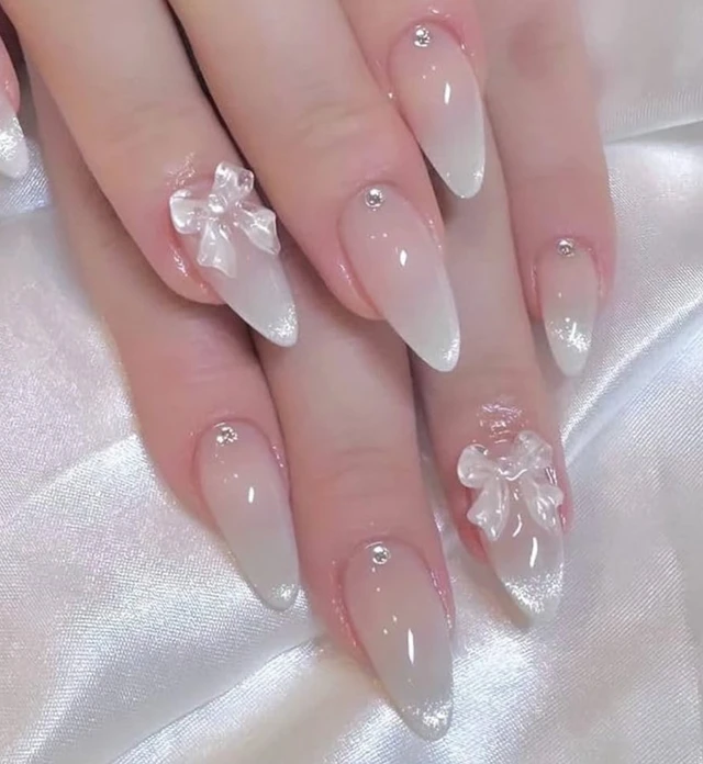 Nakhi 24 Reusable Artificial Fake Nail Set |Base Peach colour with Silver White Bow Design Glossy Nails | Lightweight & Long Lasting| Quick Fix For Festivals & Special Occasions