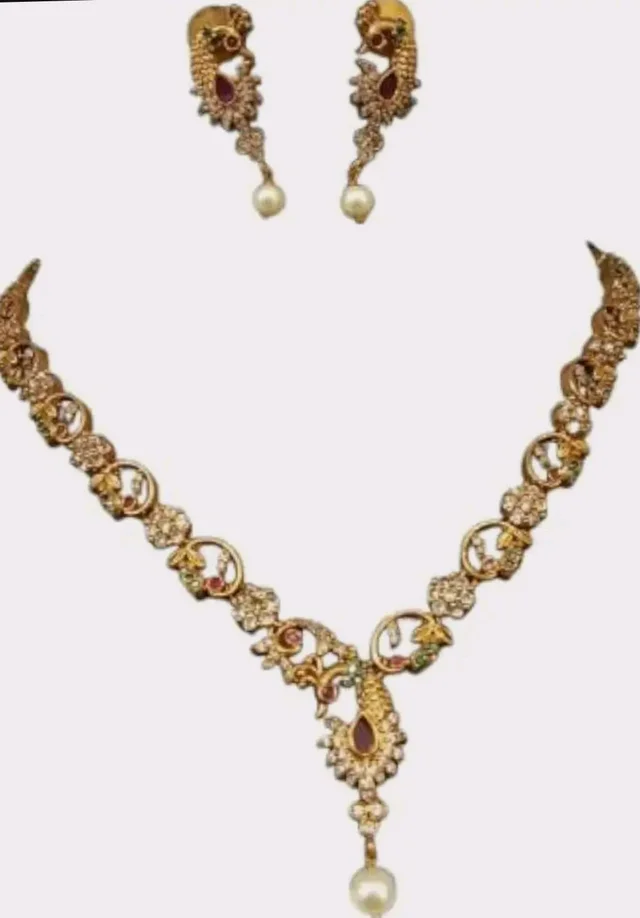 Traditional Gold-Plated Necklace Set with Pearl Drops, CZ Stones and Ruby Accents, Peacock Design,Premium Brass