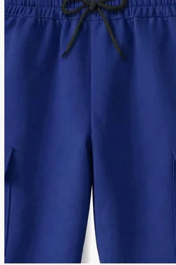 Trampoline Boys & Girls Cotton Terry Cargo Joggers with 4 Utility Pockets | Elastic Waist with Drawstring | Ribbed Cuffs | Soft Kids Jogger Pants for Casual Wear & Outdoor Play
- 10-11 y, Blue