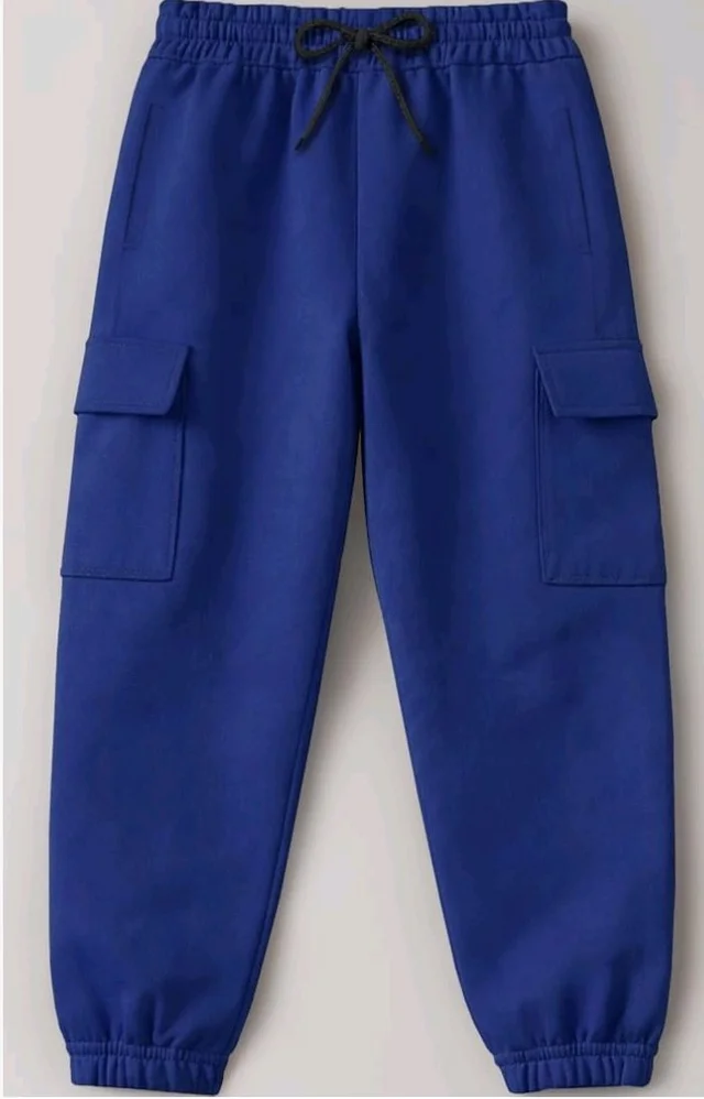 Trampoline Boys & Girls Cotton Terry Cargo Joggers with 4 Utility Pockets | Elastic Waist with Drawstring | Ribbed Cuffs | Soft Kids Jogger Pants for Casual Wear & Outdoor Play
- 14-15 y, Blue