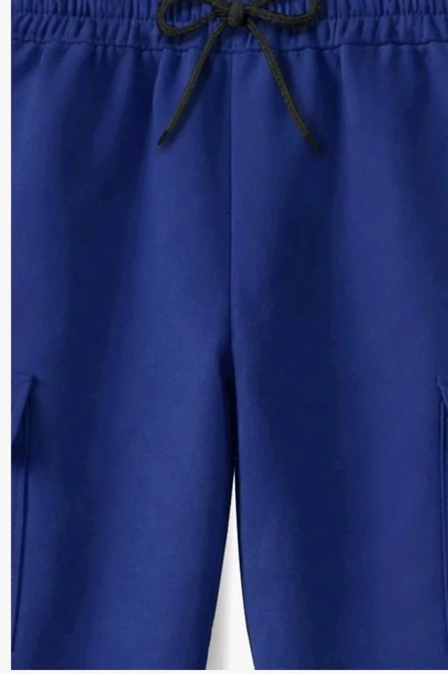 Trampoline Boys & Girls Cotton Terry Cargo Joggers with 4 Utility Pockets | Elastic Waist with Drawstring | Ribbed Cuffs | Soft Kids Jogger Pants for Casual Wear & Outdoor Play
- 16 y, Blue