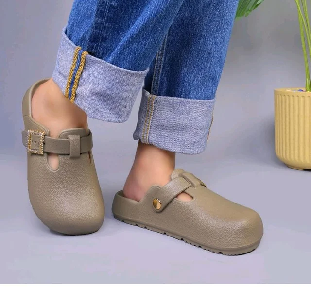 Women Buckle Accent Closed Toe Platform Slide Clogs
Textured upper with a decorative buckle strap delivers a refined modern clog look
