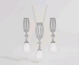 CLARA 925 Sterling Silver Pearl Queen Pendant Earring Chain for Women
Gift for Women & Girls | Platinum Plated | Swiss Zirconia | Jewellery Set