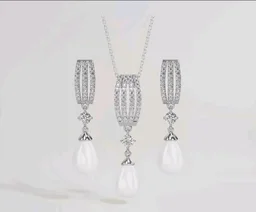 CLARA 925 Sterling Silver Pearl Queen Pendant Earring Chain for Women
Gift for Women & Girls | Platinum Plated | Swiss Zirconia | Jewellery Set