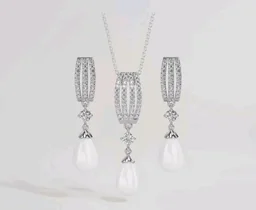 CLARA 925 Sterling Silver Pearl Queen Pendant Earring Chain for Women
Gift for Women & Girls | Platinum Plated | Swiss Zirconia | Jewellery Set