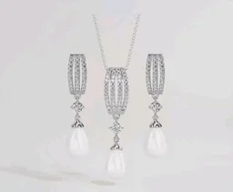 CLARA 925 Sterling Silver Pearl Queen Pendant Earring Chain for Women
Gift for Women & Girls | Platinum Plated | Swiss Zirconia | Jewellery Set