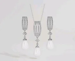 CLARA 925 Sterling Silver Pearl Queen Pendant Earring Chain for Women
Gift for Women & Girls | Platinum Plated | Swiss Zirconia | Jewellery Set