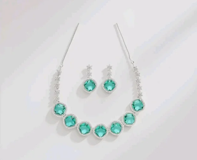 Karatcart Elegant Light Blue American Diamond Necklace Set for Women
