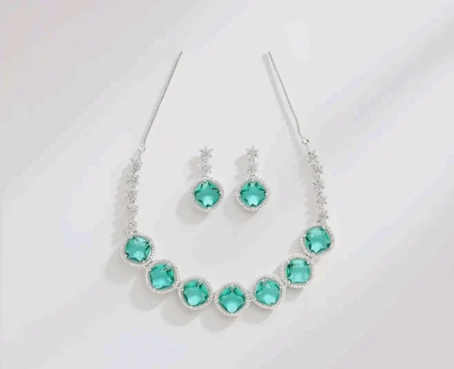 Karatcart Elegant Light Blue American Diamond Necklace Set for Women