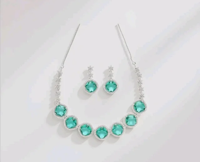Karatcart Elegant Light Blue American Diamond Necklace Set for Women