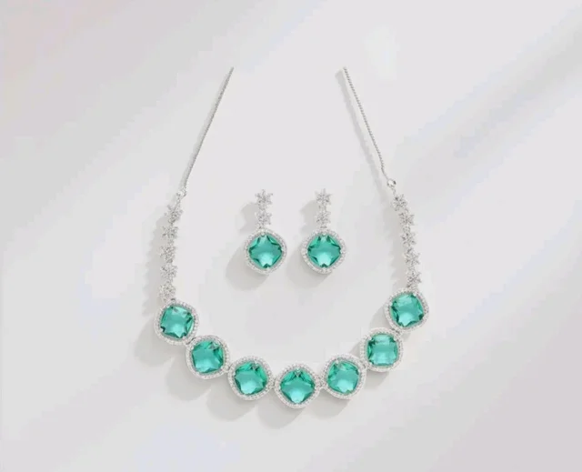 Karatcart Elegant Light Blue American Diamond Necklace Set for Women