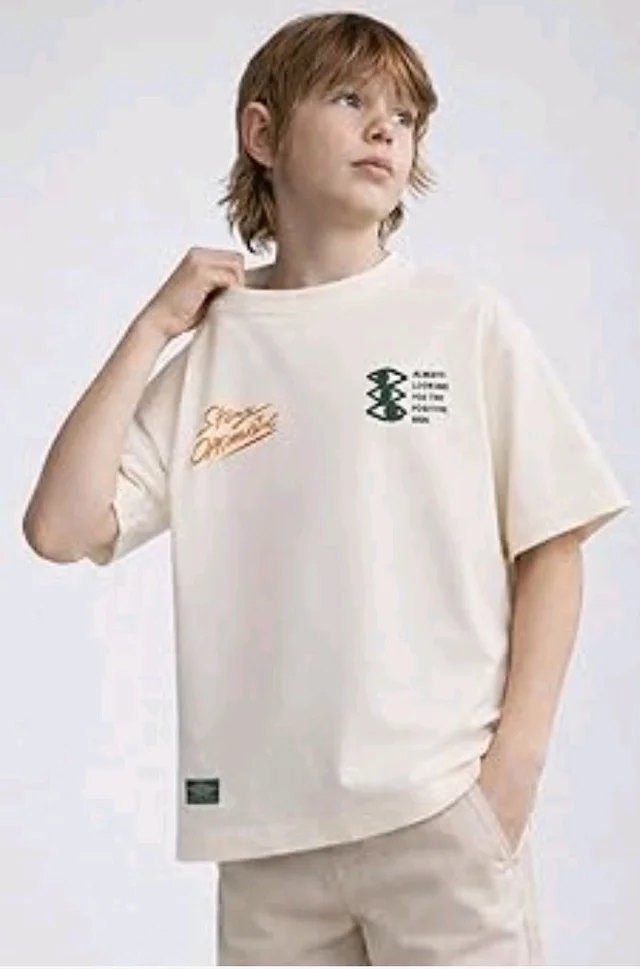 Alan Jones Clothing Boys Oversized Cotton Printed T-Shirt | Round Neck, Short Sleeves, Casual Wear
- 13 - 14 Y, Ivory