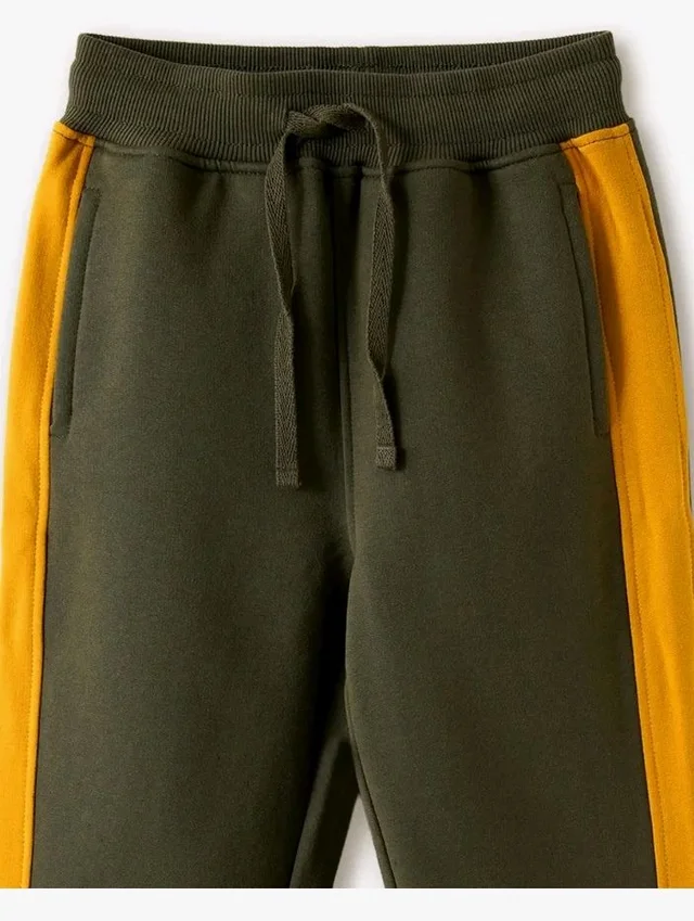 Amazon Brand - Symbol Boys Contrast Side Panelled Jogger Fit Track Pants
- 5-6 Y, Olive & Mustard