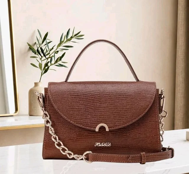 COLETTE SLING BAG TAN LIZARD
Genuine Leather
