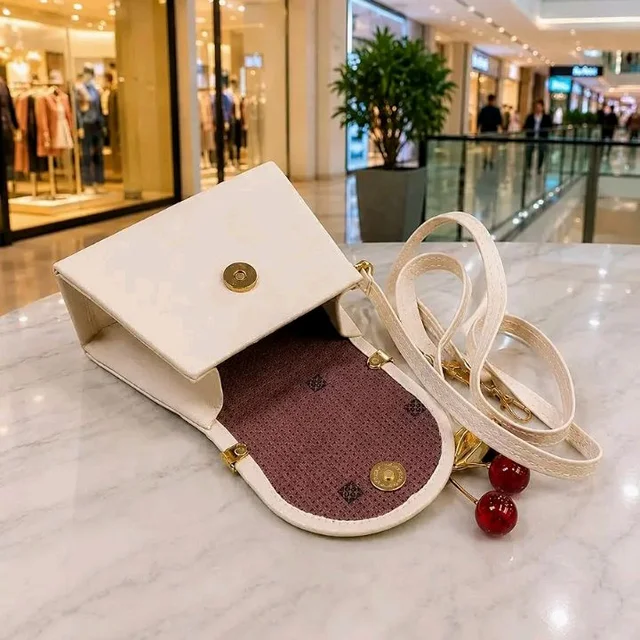 KBR® Women's Mini Crossbody Sling Bag, Textured PU Leather Shoulder Purse with Cherry Pendant Charm, Adjustable Strap, Magnetic Flap Closure, Compact Fashion Handbag for Girls & Women (Cream White)