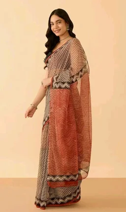 Brand: Taneira
Taneira Women Brown Block Print Bagru Pure Cotton Kota Saree with Unstitched Blouse Piece (SAAYZPAB6976-Brown)