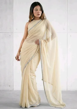 Brand: Unique Store
2.8 out of 5 stars 13
Unique Store Women Sari with Net Fabric, Elegant Lace Border and Pearl Work, Designer Saree for Wedding, Festive & Special Occasions