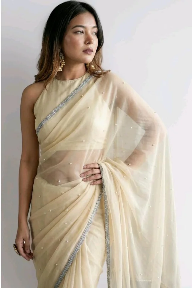 Brand: Unique Store
2.8 out of 5 stars 13
Unique Store Women Sari with Net Fabric, Elegant Lace Border and Pearl Work, Designer Saree for Wedding, Festive & Special Occasions