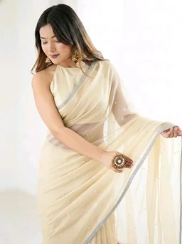 Brand: Unique Store
2.8 out of 5 stars 13
Unique Store Women Sari with Net Fabric, Elegant Lace Border and Pearl Work, Designer Saree for Wedding, Festive & Special Occasions