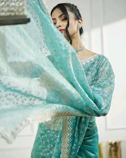 Visit the SIRIL Store
4.6 out of 5 stars 9
SIRIL Women's Shimmer Net Embroidery Stone Work Saree With Unstitched Blouse Piece