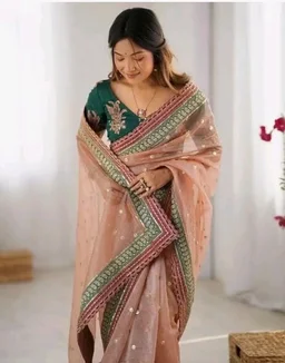 Women's Embellished Soft Net Saree with Heavy Embroidered Border & Contrast Designer Blouse Piece