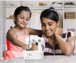 Akiara Mini Sewing Machine Electric | Portable Stitching Machine
Stitching machine for home tailoring with extension table, foot pedal, LED light. Includes 1 Year Warranty.