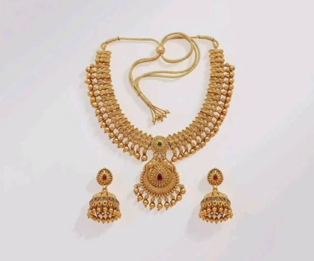Gold-Plated Antique Temple Jewellery Set for Women - Traditional Necklace with Large Peacock Pendant & Matching Jhumka Earrings | Ethnic Festive & Bridal Wear Set with Ruby & Emerald Accents