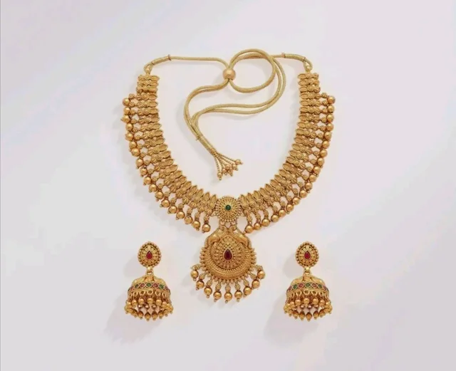 Gold-Plated Antique Temple Jewellery Set for Women - Traditional Necklace with Large Peacock Pendant & Matching Jhumka Earrings | Ethnic Festive & Bridal Wear Set with Ruby & Emerald Accents