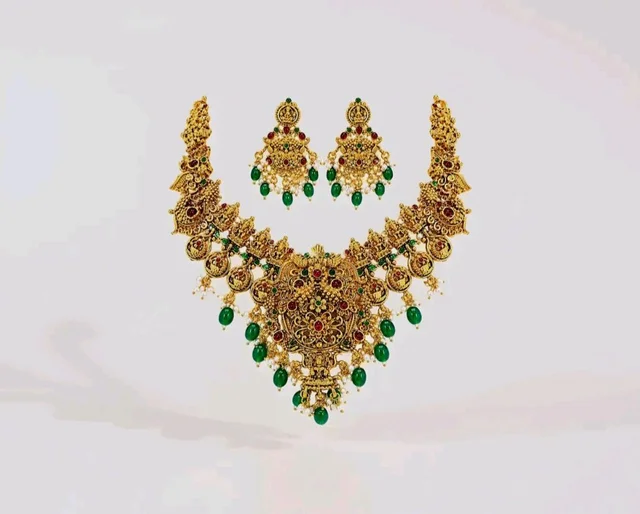 Okos Gold Plated Temple Necklace Set for Women And Girls | Traditional Multicolor Stone & Green Bead Statement Jewelry with Earrings | NL1000603GLD