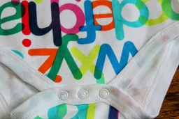 Alphabet Adventure Baby Romper" - 3-6 Month