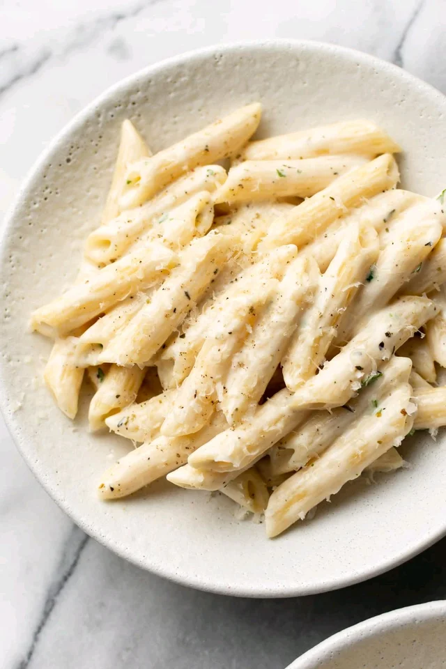 Penne Pasta With Cheese In White Sauce