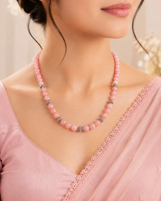 Colored beaded necklace with oxidised beads placed at regular intervals