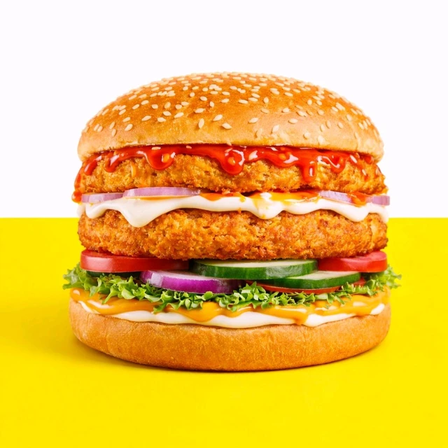 Spicy Paneer And Aloo Tikki Burger 