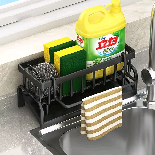 Keep your kitchen neat and tidy with our Sink Side Organizer! 🧽 Designed to hold sponges, brushes, and soap neatly in one place, it features drain holes for quick drying and a non-slip base for stability. Made from durable, waterproof material, it keeps your sink area clean, organized, and clutter-free every day!