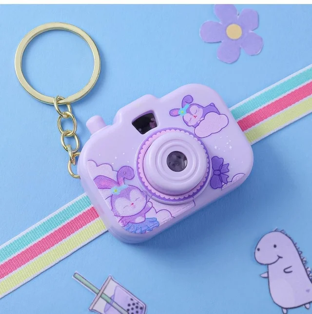 Camera projector keychain . Color random only