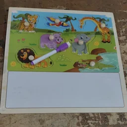 Wooden puzzle board with whiteboard on the bottom
