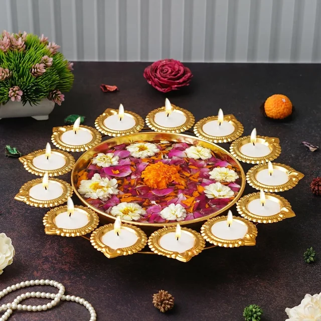 Metal urli size 12 inches All real pics shared Now you can buy soya wax filled on the sides at 100 rs extra in any design Material iron with brass coated Pic shared for reference