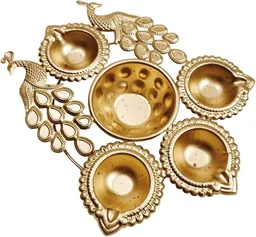 6 inch metal urli available in diya and peacock design